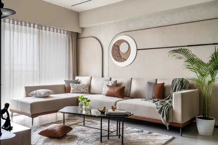 Elegant, spotless lounge with soft neutral furnishings and natural light